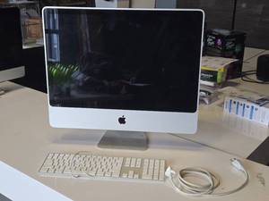 lot 10 image: Apple iMac 2.934GB256640W 24 Computer A1225