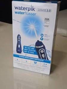 lot 46 image: Waterpik Waterflosser Cordless Water Flosser (in original packaging)