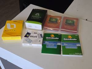 lot 49 image: Software Bundle - (2) Windows 7, (2) Quickbooks Mac 2007, (1) iWork 2008, (1) Dragon Dictate for Mac, (1) Office Mac 2008