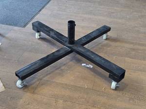 lot 64 image: 4 Caster Wheel Metal Base with 2-14 Diameter Hole