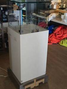 lot 178 image: Pedestal Lighted Display Case with Locking Bi-Fold Glass Doors