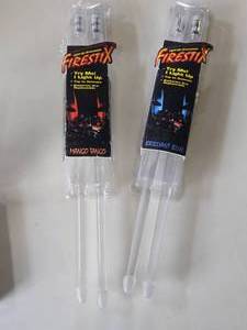 lot 196 image: Lot of (2) Firestix Light Up Drum Sticks - Mango Tango, Brilliant Blue 2-pack