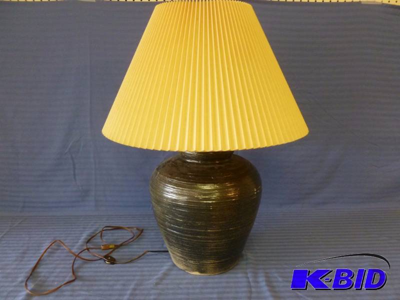 lot 66 image: Large Clay Lamp