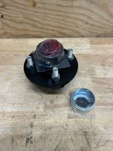 lot 245 image: ULTRA-TOW Ultra-pack trailer hub MSRP $79.99