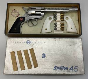 lot 1 image: Est. $250.00- $300.00 1950s Collectible Nichols Stallion 45 Mark II Cap Gun Complete With Original Box (Complete)