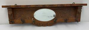 lot 57 image: Solid Oak Coat RackShelf With Beveled Oval Mirror 36 x 11 x 3 12 (Two Hangers Broke)