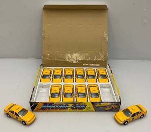 lot 58 image: New Old Stock Case Of Metro-Cab Die Metal And Plastic Cast Taxis With Pull Back And Go Action