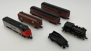 lot 66 image: Group Of N Scale Engines Including AMTRAK With Pennsylvania Train Cars And More