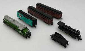 lot 67 image: Group Of N Scale Engines Including Burlington Northern With Pennsylvania Train Cars And More