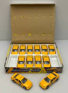 lot 71 image: New Old Stock Case Of Metro-Cab Die Metal And Plastic Cast Taxis With Pull Back And Go Action