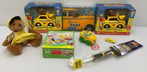 lot 115 image: Misc. Collectible Taxi Cab Toys Including Bump-N-Go Curious George And More (Most Nib)