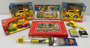lot 116 image: Misc. Collectible Taxi Cab Toys Including Bump-N-Go Curious George And More (Most Nib)