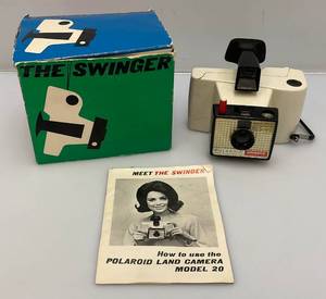 lot 176 image: Vintage Polaroid Land Camera SWINGER Model 20 With Original Box And Manual And More