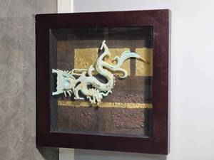 lot 231 image: Green Rust Dragon Shadow Box Sculpture