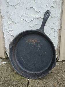lot 121 image: Cast Iron Ten Inch Skillet