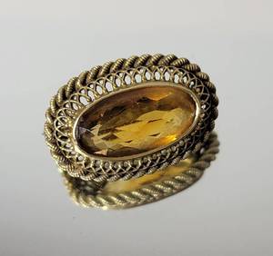 lot 42 image: 14K Yellow Gold Tanzanite Basket Bezel Pin  2g