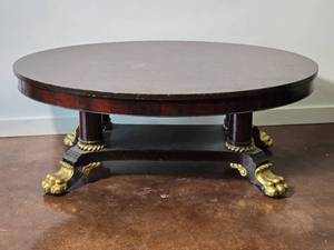 lot 148 image: Oval Empire Style Mahogany Coffee Table with Gilt Paw Feet