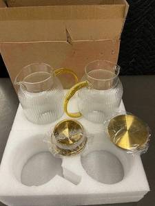 lot 46 image: Ribbed Glass Decanters with Gold Handles - 2 Large Decanters & 2 Brass Lids