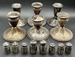 lot 11 image: Weighted Sterling Silver Candleholders and 8 Salt and Pepper Shakers