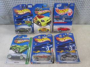 lot 159 image: (EC1) Assorted Hot Wheels in Packag...
