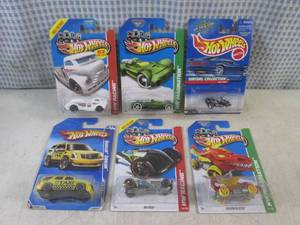 lot 160 image: (EC1) Assorted Hot Wheels in Packag...