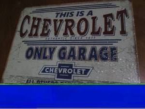 lot 510 image: Chevrolet garage metal sign...