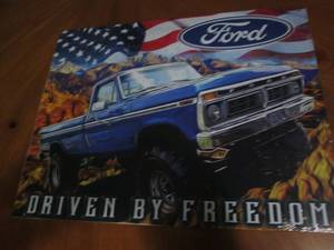 lot 515 image: Ford truck metal sign...