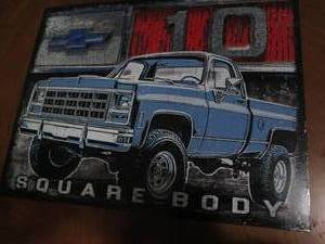 lot 523 image: Chevy metal sign...