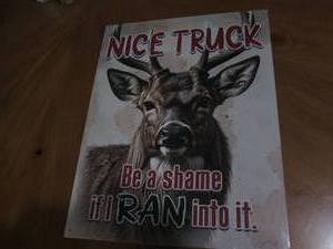 lot 525 image: Nice truck antler sign...