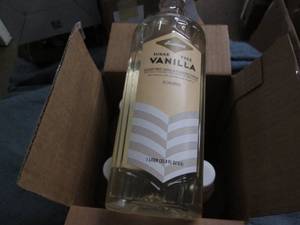 lot 36 image: 4 33.8oz bottles of sugar free vani...