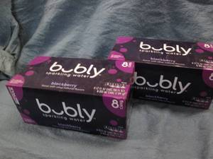 lot 128 image: 16 Cans Bubly blackberry sparkling ...