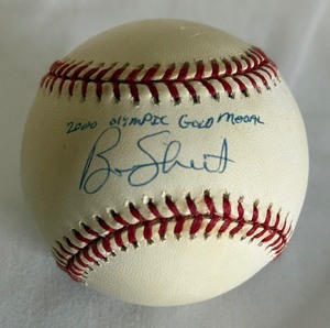lot 30A image: Ben Sheets Signed Baseball Inscribed 2000 Olympic Gold Medal With 2 COAs Rawlings OMLB Selig Ball