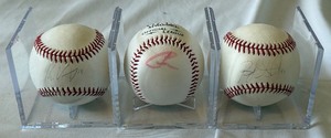 lot 130 image: 3 Minnesota Twins Signed Baseball - Kenny Vargas, Carl Pavano, Ricky Nolasco