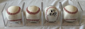 lot 131 image: 4 Minnesota Twins Signed Baseballs - Hicks, Arcia, Calabello, Gibson