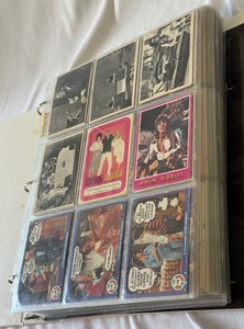 lot 134 image: HUGE Binder Full Of Non-Sports Trafing Cards - Mork and Mindy, Charlies Angels, Stooges, Lauper, Crazy Labels, Tron, Supergirl, Jaws, Dragons Lair, MAD, A-Team, Pac Man, and More