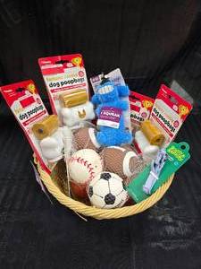 lot 31 image: Lucky Dog Basket, Squeaky Toy Balls, Squeaky Toy, Dog Collar and Doggie Poop Bags