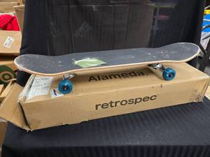 lot 49 image: New Retrospec Skateboard