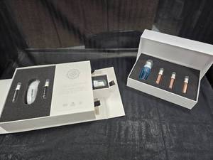 lot 72 image: Juvinesse Electro Stimulation Facial Rejuvenation Kit with Refill Kit