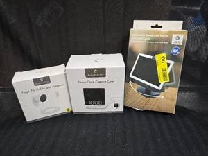 lot 81 image: Assorted Wasserstein Home Security Products, Solar Charger, Alarm Clock Camera Case and Pogo Pin Cable and Adapter