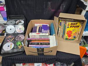lot 186 image: 1 Case of Movies 1 Box of Books 1 box of comic Books