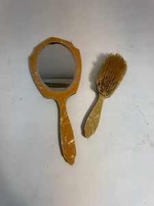 lot 35 image: Celluloid Vanity Set Brush and Handheld Mirror