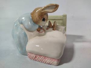 lot 35 image: Royal Albert Peter in Bed Beatrix Potter Figurine (1994)