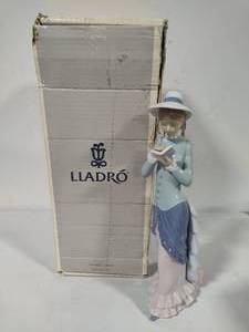 lot 54 image: Lladro Lady Reading Porcelain Figurine (#5000) In Box