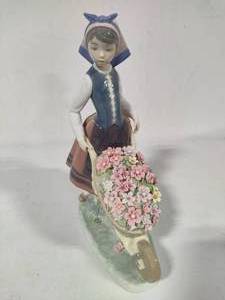 lot 56 image: Lladro A Barrow of Blossoms Porcelain Figurine (#1419)