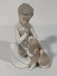 lot 59 image: Lladro Boy with Dog Porcelain Figurine (#4522)