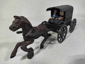 lot 103 image: Cast Iron Amish Family Horse & Buggy