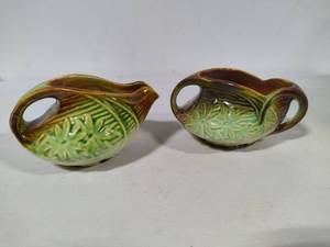 lot 109 image: McCoy Pottery Daisy Motif Sugar & Creamer Set