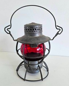 lot 63 image: Northern Pacific Retired Railroad Lantern - Red Globe