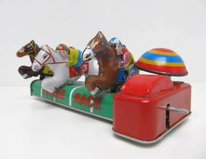 lot 9 image: Schylling Tin Litho Horse Racing Toy