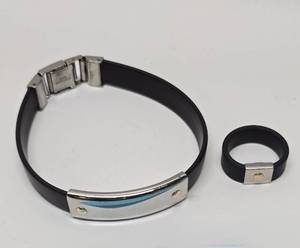 lot 211 image: Matching Stainless Steel &amp 14K Gold Bracelet &amp Ring Set